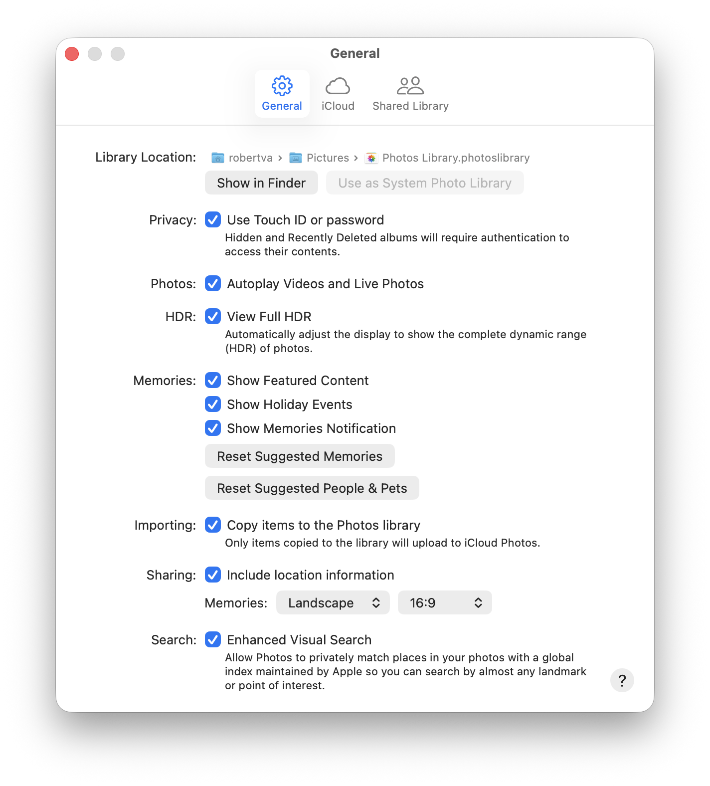 Photos settings on a Mac showing the General tab and System Photo Library controls